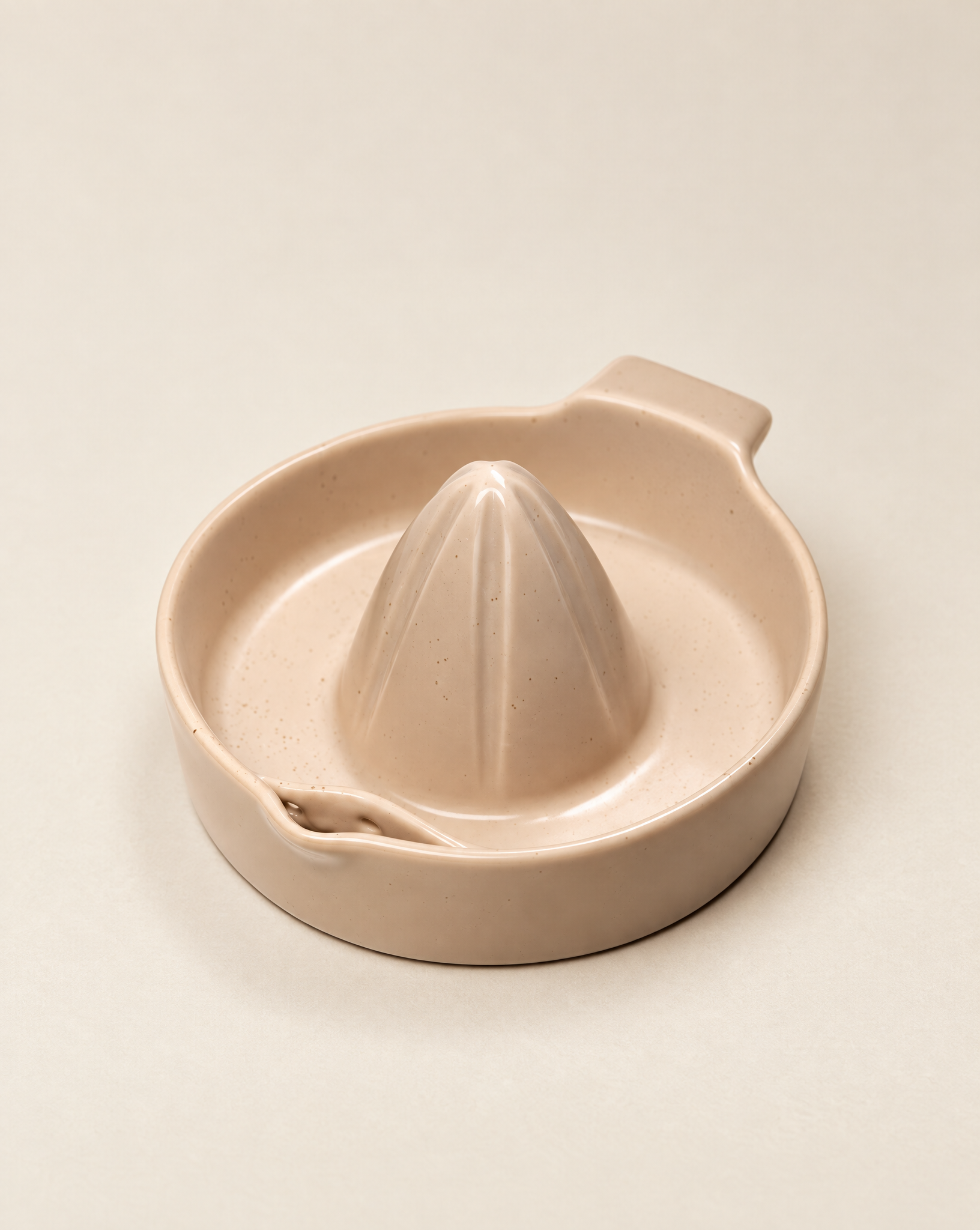 Lémoni Squeezer op beige achtergrond